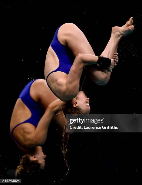 Tonia Couch and Lois Toulson of Great Britain compete during the Women's Diving 10M Synchro Platform, preliminary round on day three of the Budapest...