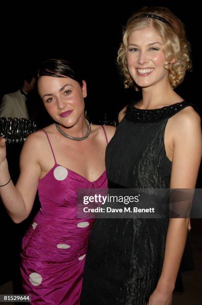 Jaime Winstone and Rosamund Pike arrive at the Swarovski Runway Rocks during the London Jewellery Week, at the Phillips De Pury Gallery on June 11,...