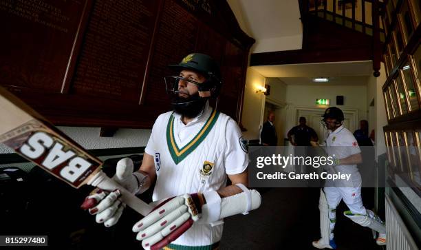 South Africa batsmen Hashim Amla and Dean Elgar walk from the pavilion ahead of day three of the 2nd Investec Test match between England and South...