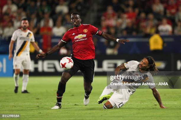 Paul Pogba of Manchester United and Jermaine Jones of LA Galaxy during to the friendly fixture between LA Galaxy and Manchester United at StubHub...