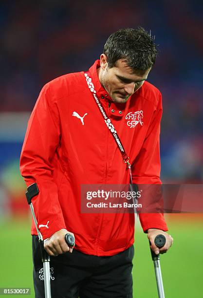 Alexander Frei of Switzerland looks dejected as he walks on crutches after the UEFA EURO 2008 Group A match between Switzerland and Turkey at St....