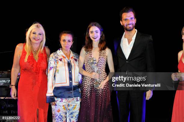 Actress Lily Collins receives Best Actress from producer Lady Monika Bacardi and Andrea Iervolino of AMBI during the 2017 Ischia Global Film & Music...