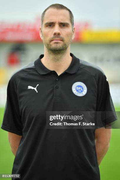 Assistant coach Chris Loeffler poses during the Third League team presentation of Sportfreunde Lotte at Frimo Stadium on July 16, 2017 in Lotte,...