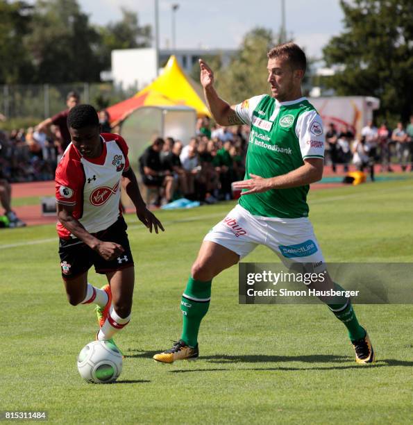 Nathan Tella from FC Southampton and Alain Wiss from St. Gallen in action during the pre-season friendly match between FC Southampton and St. Gallen...