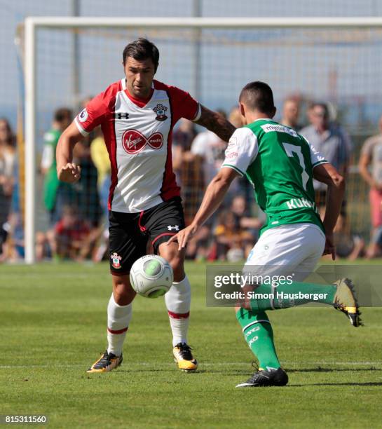 Charlie Austin from FC Southampton and Stjepan Kukuruzuvic from St. Gallen in action during the pre-season friendly match between FC Southampton and...