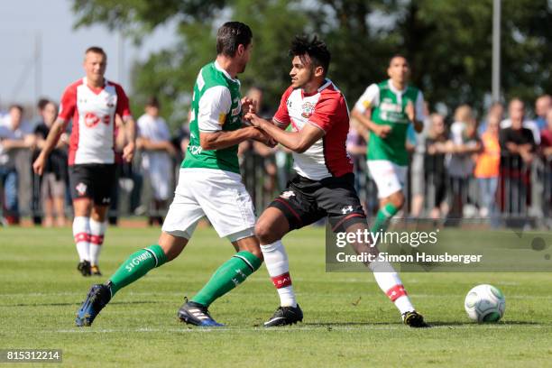 Philippe Koch from St. Gallen and Sofiane Boufal from FC Southampton in action during the pre-season friendly match between FC Southampton and St....