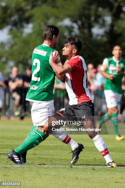 Philippe Koch from St. Gallen and Sofiane Boufal from FC Southampton in action during the pre-season friendly match between FC Southampton and St....