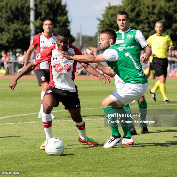 Nathan Tella from FC Southampton and Andreas Wittwer from St. Gallen in action during the pre-season friendly match between FC Southampton and St....