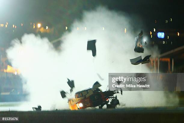 Hideki Noda of Japan crashes in the Kruse Shiller Motorsport Lola-Mazda during qualifying for the 76th running of the Le Mans 24 Hour race at the...