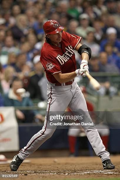 Randy Johnson of the Arizona Diamondbacks swings and misses a pitch against the Milwaukee Brewers on June 3, 2008 at Miller Park in Milwaukee,...