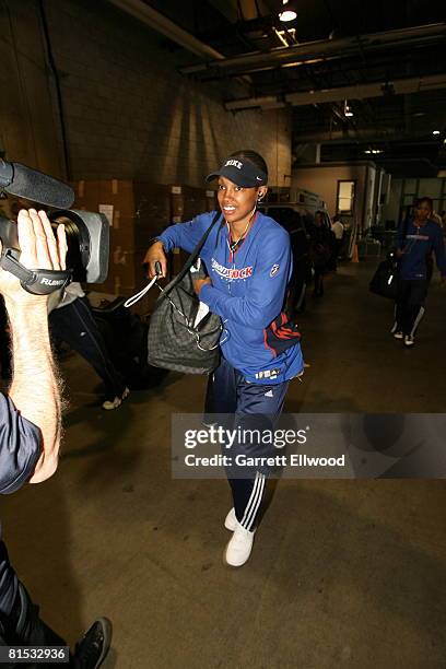 Deanna Nolan of the Detroit Shock arrives for the game against the Los Angeles Sparks at the Staples Center June 11, 2008 in Los Angeles, California....