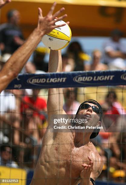 Casey Jennings hits the ball during the AVP Hermosa Beach Open final on June 8, 2008 at the Pier in Hermosa Beach, California. Phil Dalhausser and...