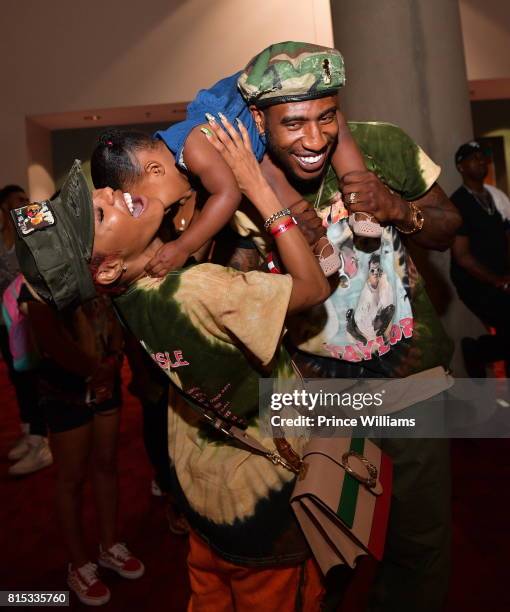 Teyana Taylor, Iman Shumpert and Iman Tayla Shumpert Jr attend 2017 V-103 Car and Bike Show GWCC Hall on July 15, 2017 in Atlanta, Georgia.