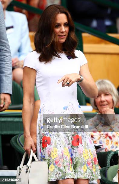 Catherine, Duchess of Cambridge looks on from the centre court royal box prior to the Gentlemen's Singles final between Roger Federer of Switzerland...