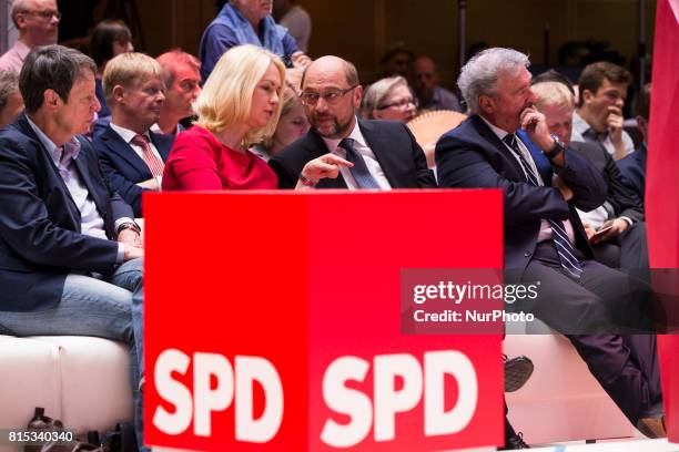 Chancellor Candidate and Chairman of the Social Democratic Party Martin Schulz chats with President of Meklenburg-Vorpommern Manuela Schweisg during...