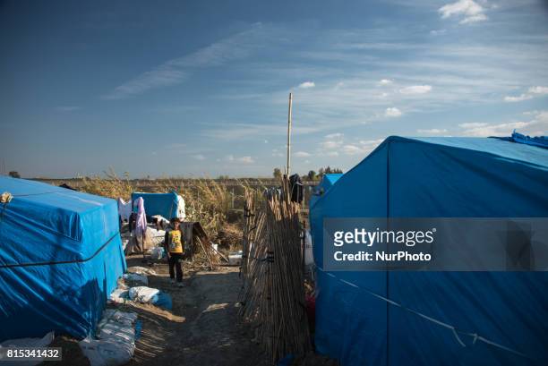 Syrian refugees working in the agricultural camps in Adana, Turkey, on 16 July 2017. Syrian refugees lacking work permits and Turkish language skills...