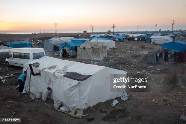 Syrian refugees working in the agricultural camps in Adana, Turkey, on 16 July 2017. Syrian refugees lacking work permits and Turkish language skills...