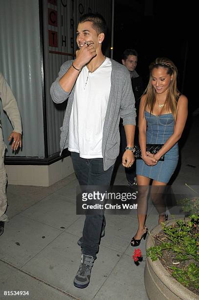 Television personality Robert Kardashian and singer Adrienne Bailon arriving at Crown Bar club on June 11, 2008m in West Hollywood, California.
