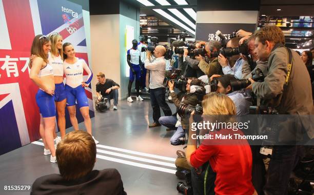 Members of the Olympic Team GB Heather Fell, Tom Daley and Victoria Pendleton pose for photographers during the adidas Team GB Olympic and Paralympic...