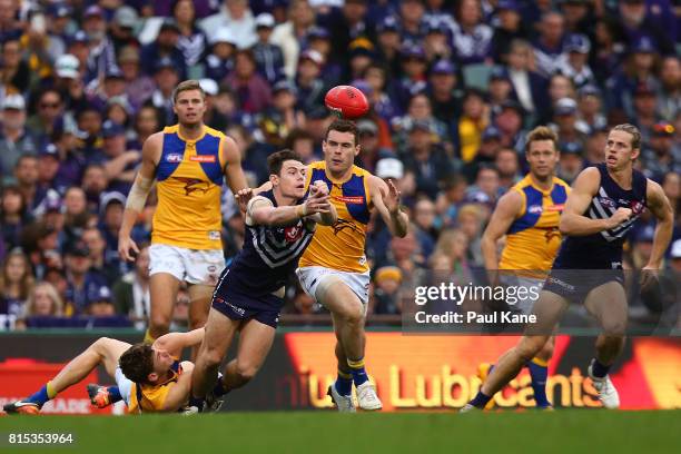 Lachie Neale of the Dockers handballs during the round 17 AFL match between the Fremantle Dockers and the West Coast Eagles at Domain Stadium on July...