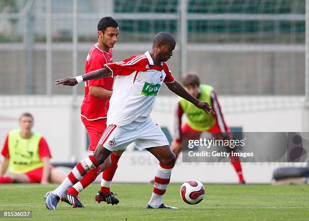 Oemer Toprak of Freiburg attempts to tackle Jose Vunguidica of Koeln during the A Juniors semi final match between SC Freiburg and 1. FC Koeln at the...