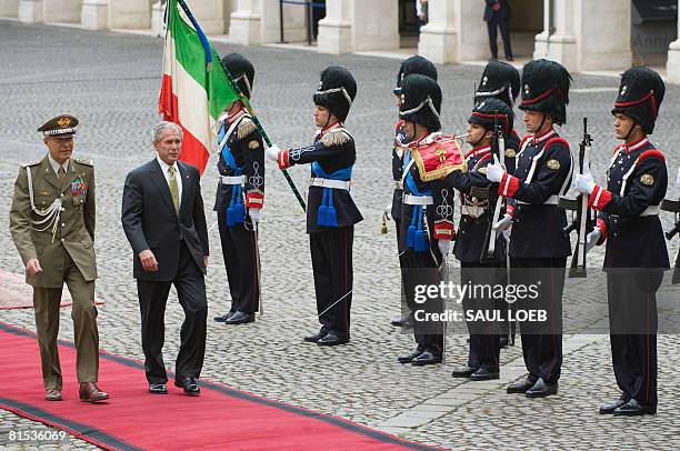 Italian Army General Rolando Mosca Moschini escorts US President George W. Bush past the Granatieri Di Sardegna of the Guardia d'Onore upon arrival...