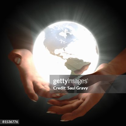 Globe in hands Globe in hands
