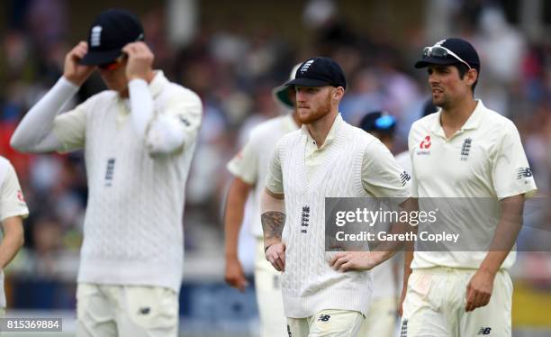 Ben Stokes and Alastair Cook of England react during day three of the 2nd Investec Test match between England and South Africa at Trent Bridge on...