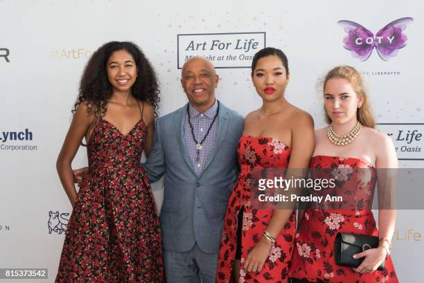 Russell Simmons, Ming Lee Simmons and Aoki Lee Simmons attend 2017 Rush Philanthropic Arts Foundation Art For Life Benefit at Fairview Farms on July...