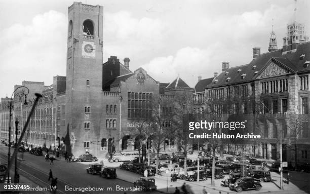 The Beurs van Berlage or Commodities Exchange on the Damrak in Amsterdam, circa 1930. It was designed by Dutch architect Hendrik P. Berlage and...