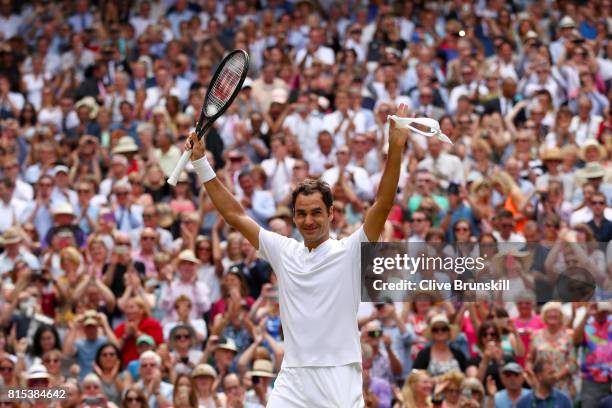 Roger Federer of Switzerland celebrates victory after the Gentlemen's Singles final against Marin Cilic of Croatia on day thirteen of the Wimbledon...