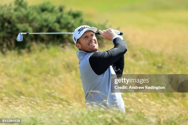 Andrew Dodt of Australia hits his second shot on the 1st hole during the final round of the AAM Scottish Open at Dundonald Links Golf Course on July...