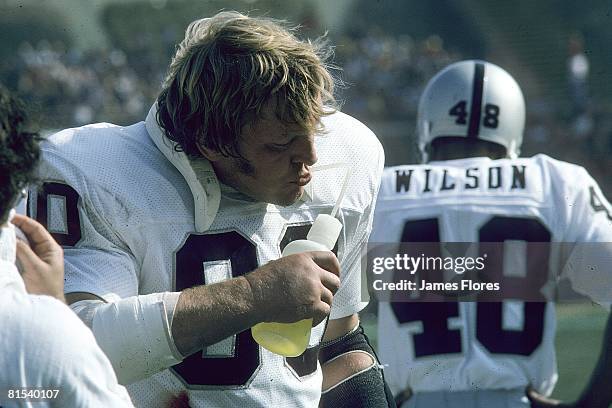 Center Jim Otto of the Oakland Raiders drinks Gatorade on the sideline against the San Diego Chargers at San Diego Stadium on December 3, 1972 in San...
