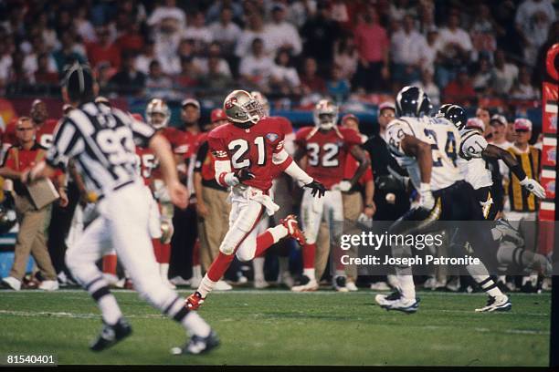 Cornerback Deion Sanders of the San Francisco 49ers runs a pass pattern as a wide reciver against the San Diego Chargers in Super Bowl XXIX at Joe...