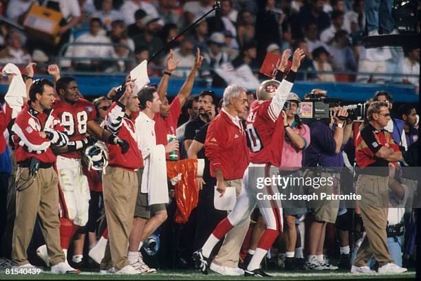 Head coach George Seifert of the San Francisco 49ers watches from the sideline against the San Diego Chargers in Super Bowl XXIX at Joe Robbie...