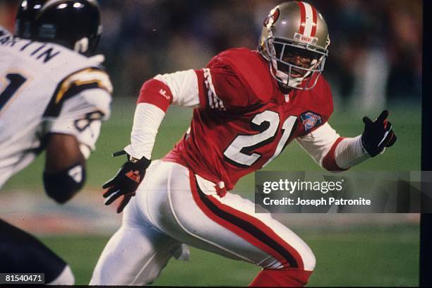 Cornerback Deion Sanders of the San Francisco 49ers covers wide receiver Tony Martin of the San Diego Chargers in Super Bowl XXIX at Joe Robbie...