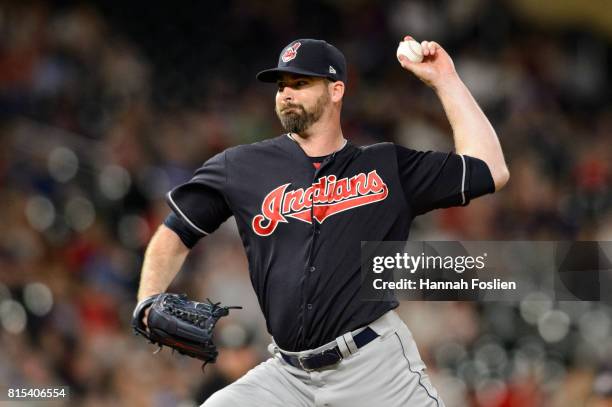 Boone Logan of the Cleveland Indians delivers a pitch against the Minnesota Twins during the game on June 16, 2017 at Target Field in Minneapolis,...