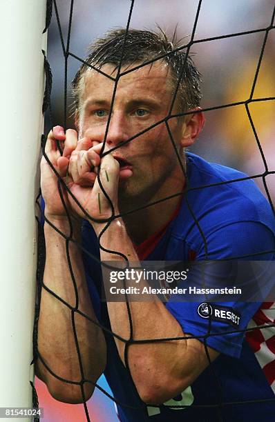 Ivica Olic of Croatia holds onto the net during the UEFA EURO 2008 Group B match between Croatia and Germany at Worthersee Stadion on June 12, 2008...