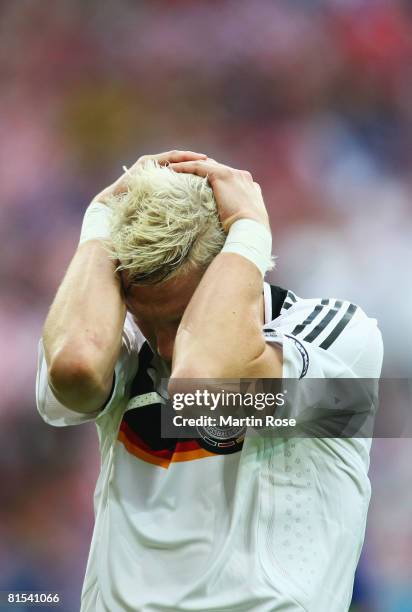 Bastian Schweinsteiger of Germany holds his head in frustration during the UEFA EURO 2008 Group B match between Croatia and Germany at Worthersee...