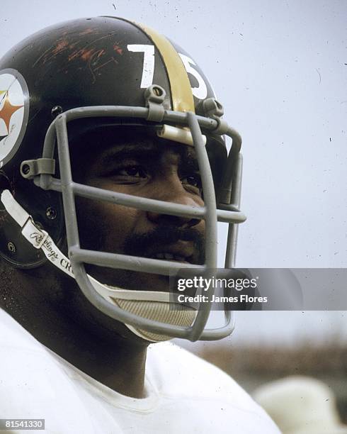Defensive tackle "Mean Joe" Greene of the Pittsburgh Steelers watches from the sideline against the San Diego Chargers during an NFL game at San...