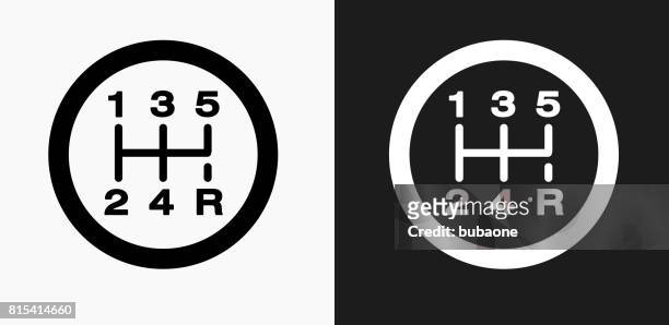 stick shift icon on black and white vector backgrounds - gearstick stock illustrations