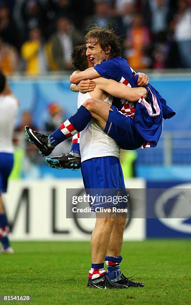 Ivica Olic and Luka Modric of Croatia celebrate after winning the UEFA EURO 2008 Group B match between Croatia and Germany at Worthersee Stadion on...