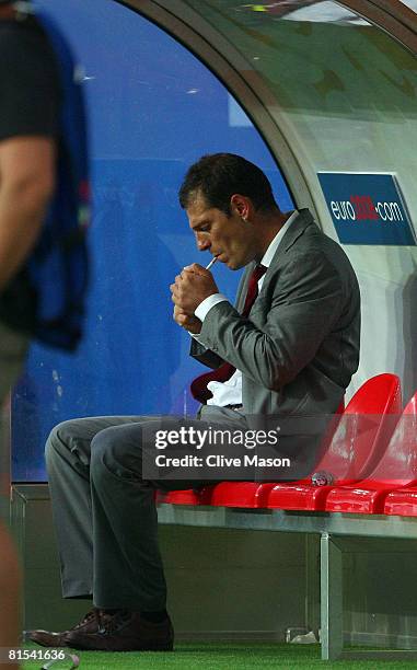 Slaven Bilic head coach of Croatia has a cigarette after victory in the UEFA EURO 2008 Group B match between Croatia and Germany at Worthersee...