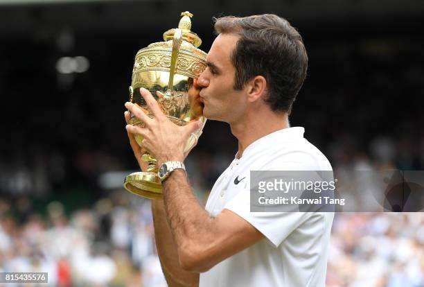 Roger Federer kisses the trophy after winning the Men's Final during day 13 of Wimbledon 2017 on July 16, 2017 in London, England.