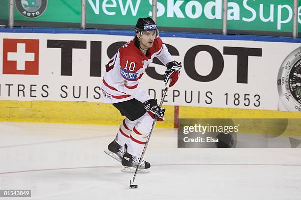 Patrick Sharp of Canada skates with the puck against Sweden during the Semifinal round of the International Ice Hockey Federation World Championship...