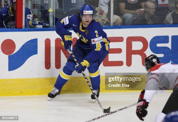 Douglas Murray of Sweden plays the puck against Canada during the Semifinal round of the International Ice Hockey Federation World Championship at...