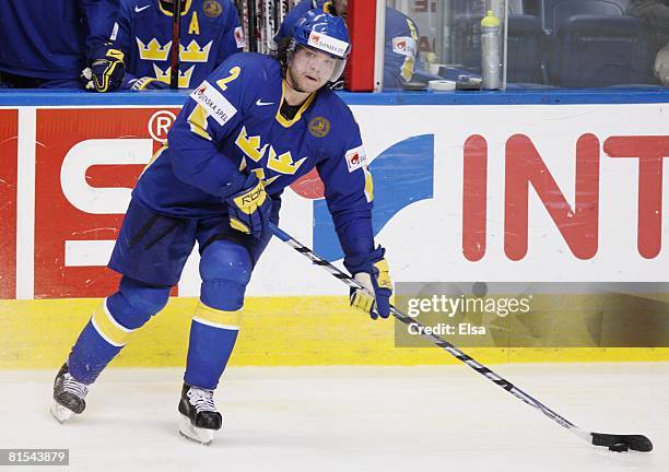 Douglas Murray of Sweden plays the puck against Canada during the Semifinal round of the International Ice Hockey Federation World Championship at...