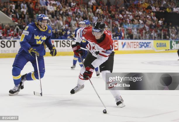 Eric Staal of Canada skates with the puck against Sweden during the Semifinal round of the International Ice Hockey Federation World Championship at...