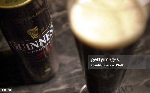 Glass of Guinness stout sits on a bar March 8, 2001 in New York City. The traditional popular Irish brew will be in demand more than ever in the new...