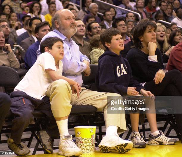 Director Rob Reiner and his family watch a game between the San Antonio Spurs and the Los Angeles Lakers March 9, 2001 in Los Angeles, CA.